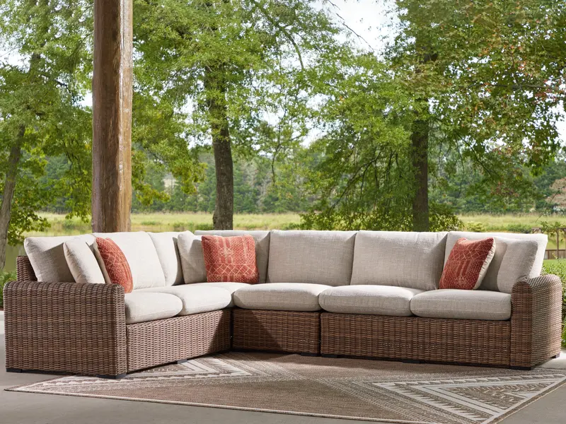 Dolan Creek Beige-And-Brown Outdoor Sectional – Four-Piece Modular Sofa 1
