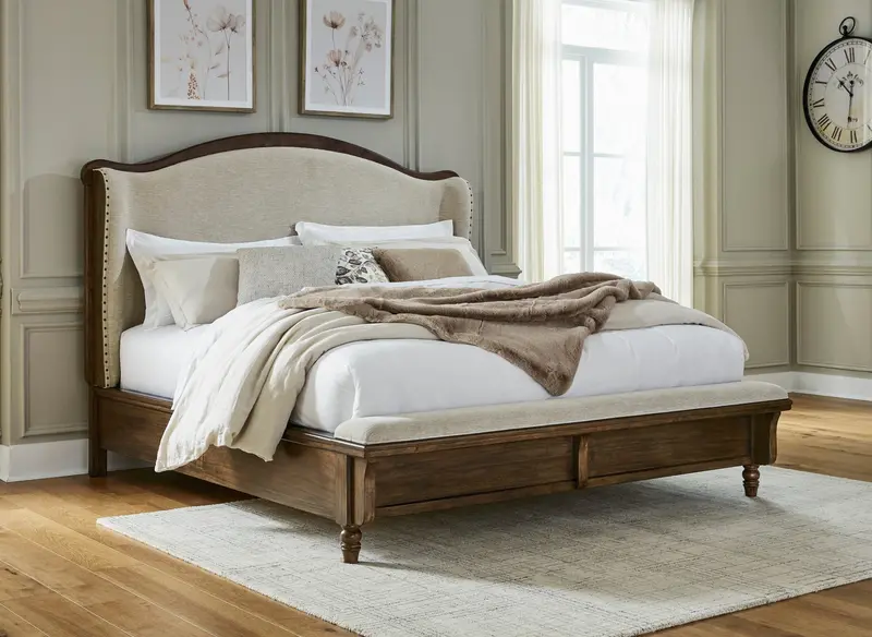 Sturlayne Brown California King Upholstered Bed With Integrated Footboard Bench 1